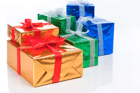 Presents and Celebration Concepts. Many Colorful Wrapped Up Gift Boxes Standing In Line Together....