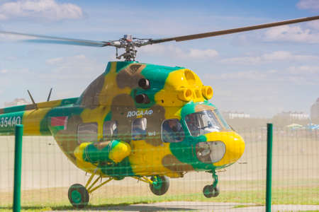 Minsk, Belarus-June 21, 2014: MI-2 Helicopter on Air During Aviation Sport Event Dedicated to the 80th Anniversary of DOSAAF Foundation in Minsk on June 21, 2014 in Minsk, Republic of Belarusのeditorial素材