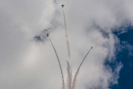 Minsk, Belarus-June 21, 2014: Acrobatic Stunt Planes RUS of Aero L-159 ALCA on Air During Aviation Sport Event Dedicated to the 80th Anniversary of DOSAAF Foundation in Minsk on June 21, 2014 in Minsk, Republic of Belarusのeditorial素材