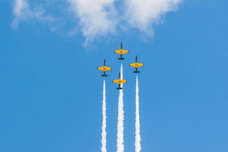 Minsk, Belarus-June 21, 2014: Acrobatic Stunt Planes RUS of Aero L-159 ALCA on Air During Aviation Sport Event Dedicated to the 80th Anniversary of DOSAAF Foundation in Minsk on June 21, 2014 in Minsk, Republic of Belarusのeditorial素材