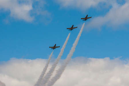 Minsk, Belarus-June 21, 2014: Acrobatic Stunt Planes RUS of Aero L-159 ALCA on Air During Aviation Sport Event Dedicated to the 80th Anniversary of DOSAAF Foundation in Minsk on June 21, 2014 in Minsk, Republic of Belarusのeditorial素材