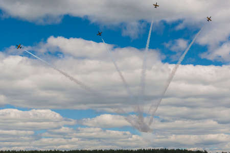 Minsk, Belarus-June 21, 2014: Acrobatic Stunt Planes RUS of Aero L-159 ALCA on Air During Aviation Sport Event Dedicated to the 80th Anniversary of DOSAAF Foundation in Minsk on June 21, 2014 in Minsk, Republic of Belarusのeditorial素材