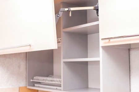 Lines of Empty Kitchen Cabinets at Renovated Kitchen. Horizontal Image Orientationの写真素材