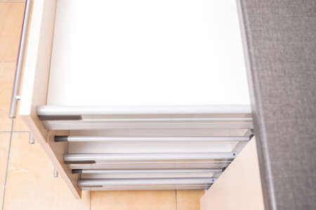 Kitchen Shelves Stack on New Restored Interior. Horizontal Imageの写真素材