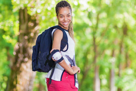 Lifestyle Concepts. Portrait of Happy Positive African American Teenage Girl. Posing Outdoors in...