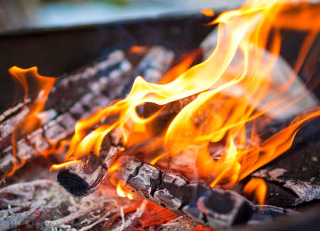 Closeup of Flames of Fire Of Bonfire Ooutdoors. Horizontal Shot