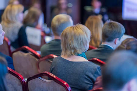 Back View of Woman Listening During the  Conference.Horizontal Image Composition