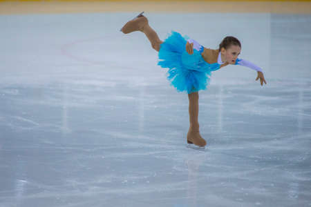 Minsk, Belarus -April 23, 2017: Unidentified Female Figure Skater performs Chicks Ladies Free Skating Program at Minsk Arena Cup 2017 International Figure Skating Competition in April 23,  2017 in Minsk, Belarusのeditorial素材