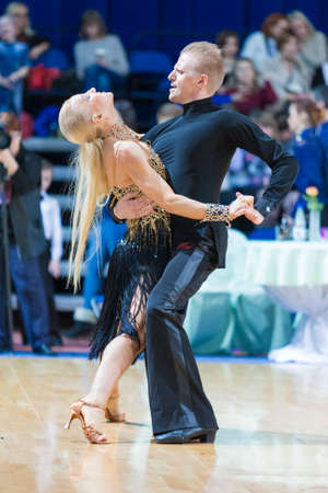 Minsk, Belarus-February 18, 2017: Pro-Am Couple of Ivan Miskevich and Svetlana Rodina Performs Pro-Am Super Cup International Latin Program on WDSF Minsk Open Dance Festival-2017 Championship in February 18, 2017 in Minsk, Belarus.のeditorial素材