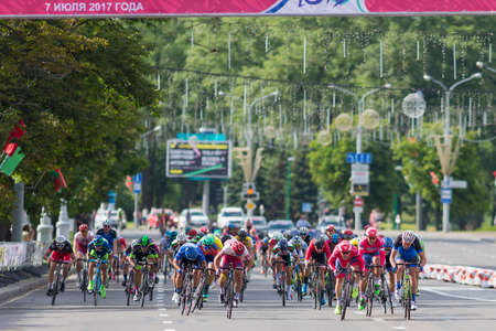 Minsk, Belarus-July 8, 2017: Evgeny Korolek from Belarus Crossing the Finish Line in Front of Peloton During International Road Cycling Competition Grand Prix Minsk-2017 on July 8, 2017 in Minsk, Belarusのeditorial素材