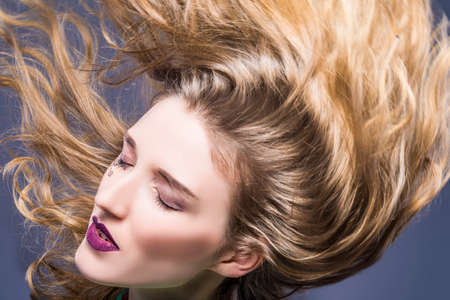 Beauty Ideas and Concepts. Portrait of Passionate Caucasian Brunette Girl with Disheveled Hair and...