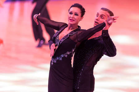 Minsk,Belarus-October 7,2017:Pro-Am Dance Couple of Dmitriy Pleshkov and Nadezhda Shcherchkova Performs Pro-Am International Scholarship Latin-American Program on WDSF International Capital Cup Minsk,October 7,2017, Minsk,Belarusのeditorial素材
