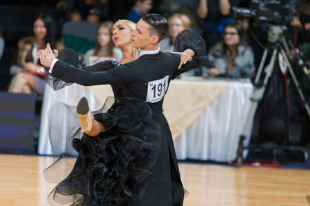 Minsk, Belarus-October 7, 2017: Dance Couple of Kezin Evgeny and Karabatova Polina Performs Adults European Standard Program on WDSF International Capital Cup Minsk- 2017 in October 7, 2017 in Minsk, Belarusのeditorial素材