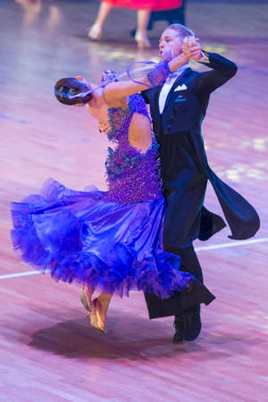 Minsk, Belarus October 29, 2017: Professional Dance Couple Perform Youth Standard European Program on the WDSF International WR Dance Cup in October 29, 2017 in Minsk, Republic of Belarusのeditorial素材