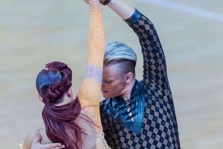 Minsk, Belarus-October 28, 2017: Professional Dance Couple Performs Youth-2 Latin-American Program on WDSF International WR Dance Cup in October 28, 2017, in Minsk, Republic of Belarus.のeditorial素材