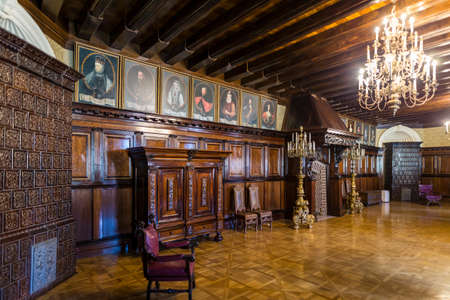 Nesvizh,Belarus-August 5,2017:The Fireplace Hall(The Dining Hall)in Nesvizh Radziwill Palace.Used as Premises toShowcase of Work of Arts.In XVIII Century WasDecorated With Portrait of Xavier Hessky,August 5,2017,Nesvizh,Belarusのeditorial素材