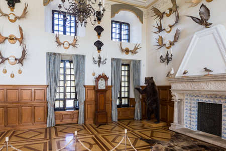 Nesvizh,Belarus-August 5,2017:The Hunting Hall of Castle Used as Transit Corridor to The gallery of The Chapel.Had Trophies of Antlers of Deers, Stuffed Bears, Wood-Grouses and Other Birds and Animals,August 5,2017,Nesvizh,Belarusのeditorial素材