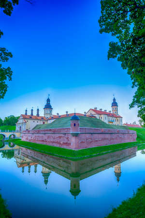 Travel Concepts. Renowned Nesvizh Castle as an Example of World Historical Heritage of Radzivil Family. Shot from the Moat. Vertical Imageのeditorial素材