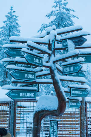 Rovaniemi- Finland, January, 1, 2018: Plenty of Various Directions Signs Located in Santa Claus (Joulupukki) Village in Rovaniemi Village in Finland in January 1, 2018のeditorial素材