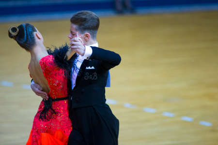 Minsk-Belarus, March 11, 2018: Dance Couple Performs Junior-2 Standard Program on WDSF National...
