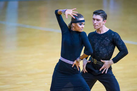 Minsk-Belarus, March 11, 2018: Dance Couple Performs Adult Latin â€“American Program on WDSF...