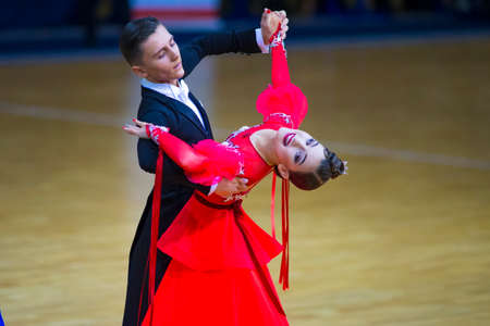 Minsk-Belarus, March 11, 2018: Dance Couple Performs Junior-2 Standard Program on WDSF National Championship of the Republic of Belarus in March 11, 2018 in Minsk, Belarusのeditorial素材