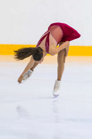 Minsk, Belarus April 22, 2018: Female Figure Skater Performs Girls Free Skating Program at Minsk Arena Cup 2018 in April 22, 2018, in Minsk, Belarusのeditorial素材