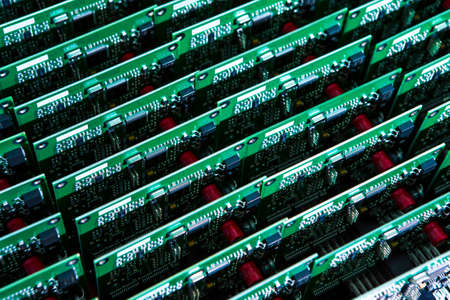 Electronics Concepts. Batch of Ready  Printed Circuit Boards with Surface Mounted Components. Horizontal Image Orientationの写真素材