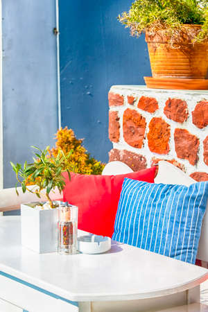 Romantic and Cosy Sofa Place for Two at Santorini Lovers Island in Oia Village, Greece.Vertical...