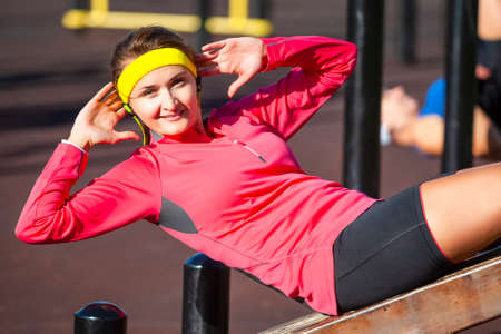 Sport Concepts. Happy Positive Caucasian Girl in Outdoor Sport Outfit Making Press-Ups on Long...