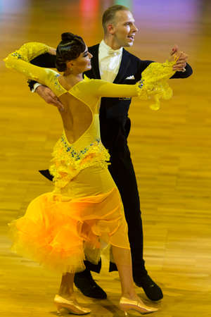 Minsk, Belarus-October 14, 2018: Dance Couple Performs WDC World Professional 10 Dance Pro-Am International Scholarship on European Standard Program on Capital Cup,October 14, 2018, Minsk, Belarusのeditorial素材