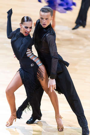 Minsk, Belarus-October 14, 2018: Professional Dance Couple Performs Adult Latin-American Program on WDSF International Capital Cup Minsk,October 14, 2018, Minsk,Belarus.のeditorial素材