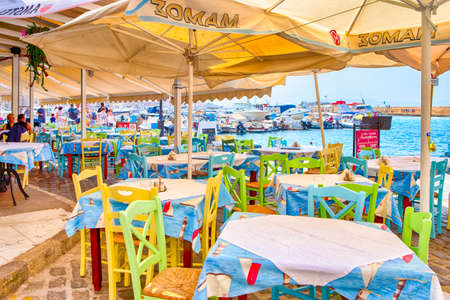 Sunny Open Air Restaurant in Chania City on Crete. Decorated wirh Classic Greek Blue and White Colors.Horizontal Image Orientationのeditorial素材