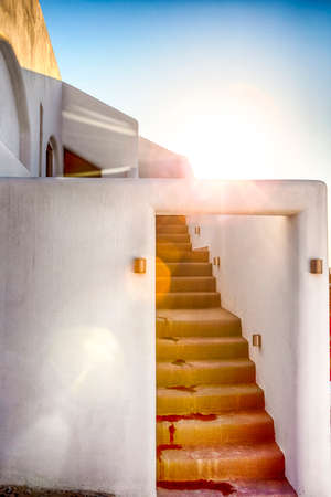 Classic Architecture of Sunny Oia Village in Santorini Island in Greece.Vertical Image Composition