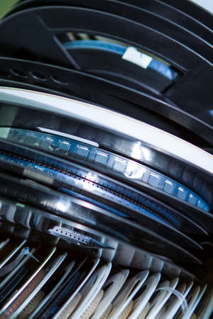 Microelectronic Components. Surface Mount Components On tape and Reel Package. Variety of Reels in One Stack Together. Vertical imageの写真素材