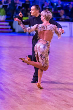 Riga, Latvia-December 16, 2018: Professional Adult Dance Couple Performs Youth Latin-American Program on the WDSF Baltic Grand Prix-2108 Championship in December 16, 2018 in Riga, Latviaのeditorial素材