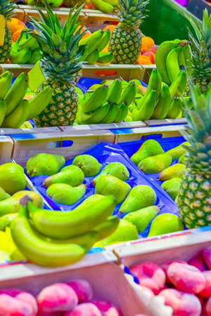 Variety of Fresh Fruits for Sale on Stand.Vertical Imageの写真素材