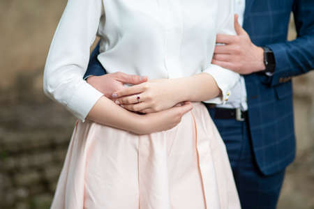 Closeup of Hands of Caucasian Couple In Love.Horizontal Imageの写真素材