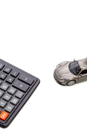 Concept of Car and Calculator as Credit and Finances Illustration. Vertical Image Compostionの写真素材