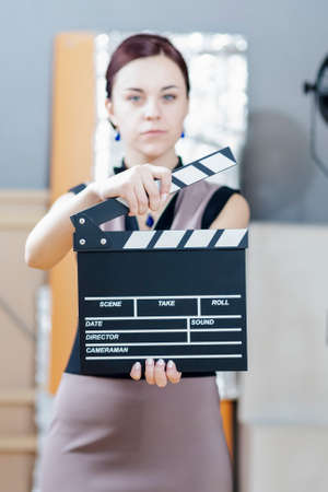 Caucasian Woman Posing with Action Cut in Studio Environment. Vertical image Compositionの写真素材