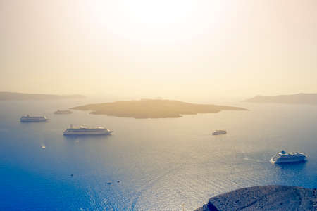 Cruise Ships Parking in Sanrtirni Island for Sunset Observation in Fira (Thira) City. Horizontal Imageの写真素材