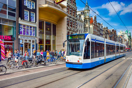 Delft, Netherlands - May 7, 2017: Modern Dutch City Tram Passing Through the City of Delft in Holland, May 7, 2017のeditorial素材