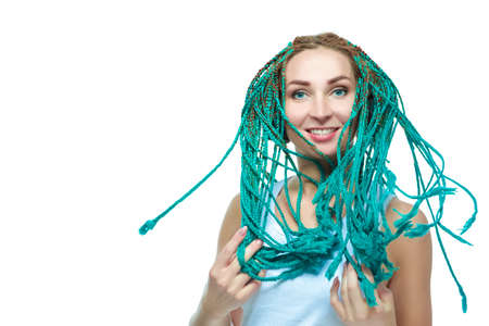 Smiling Caucasian Female with African American Dreadlocks Posing in Casual Clothing And Headphone....