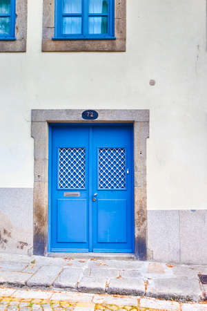 Travel Places Concepts. Unique Entrance Door in Porto, Portugal. Vertical Image