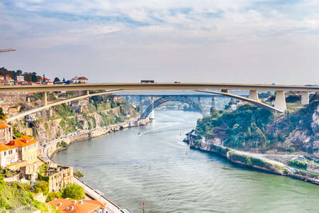 Travel Places Ideas. Porto Cityscape at Daytime with Ponte Infante D Henrique in Background in...
