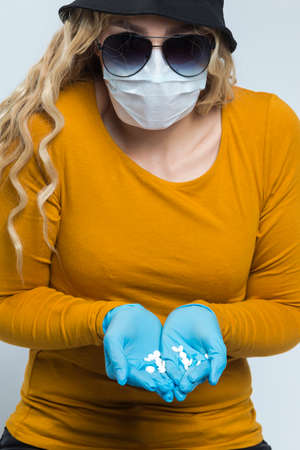 Caucasian Woman Wearing Flu Virus Mask For Viral Prevention With Black Glasses.Posing in Protective...