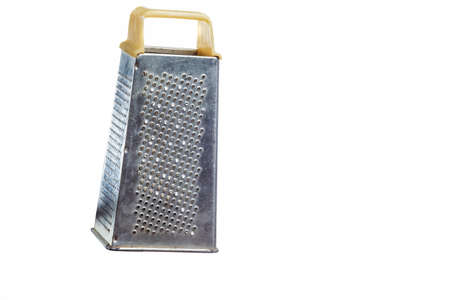 Old Used Grater Made of Stainless Steel Isolated Over Pure White Background. Horizontal Shotの写真素材