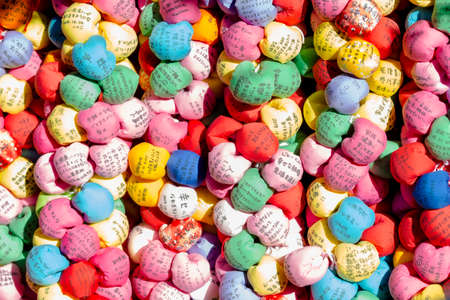 KYOTO, JAPAN - NOVEMBER, 8, 2019: Variety of Kyoto Colorful Temple Charms. Traditional Colorful Emas Formed as Colorful Squishy Balls And Made of Cloth At Kyoto Templeのeditorial素材