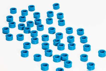 Electronic Components Concepts. Variety of Ferrite Magnetic Cores of Blue Color. Isolated On White....