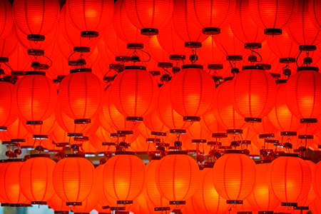 Japan Travel Destinations. variety of Traditional Japanese red Lanterns Hinged indoors. Horizontal Imageの写真素材